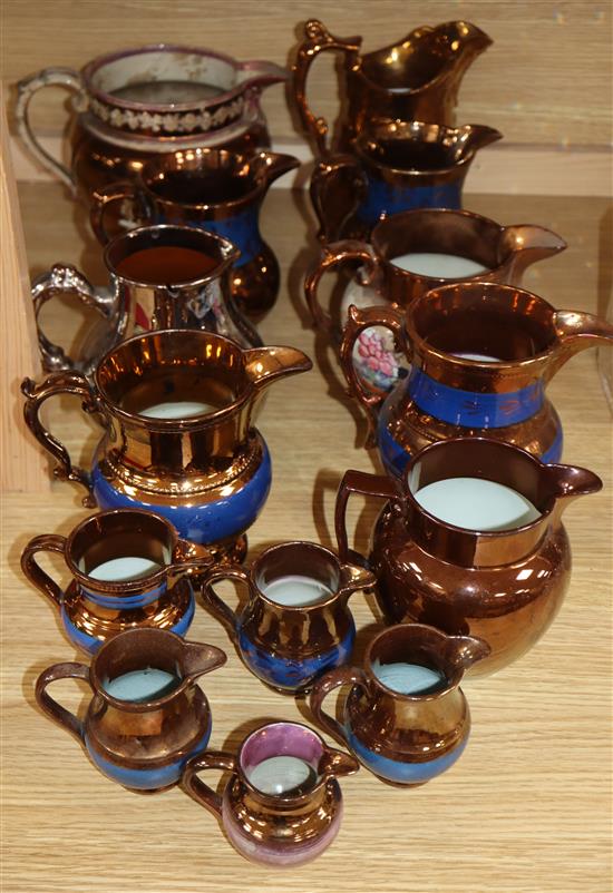 A group of Staffordshire copper lustre jugs